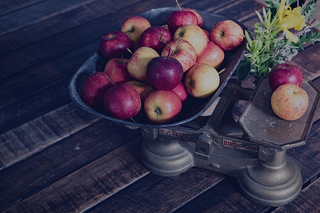 old fashioned scale weighing fruit