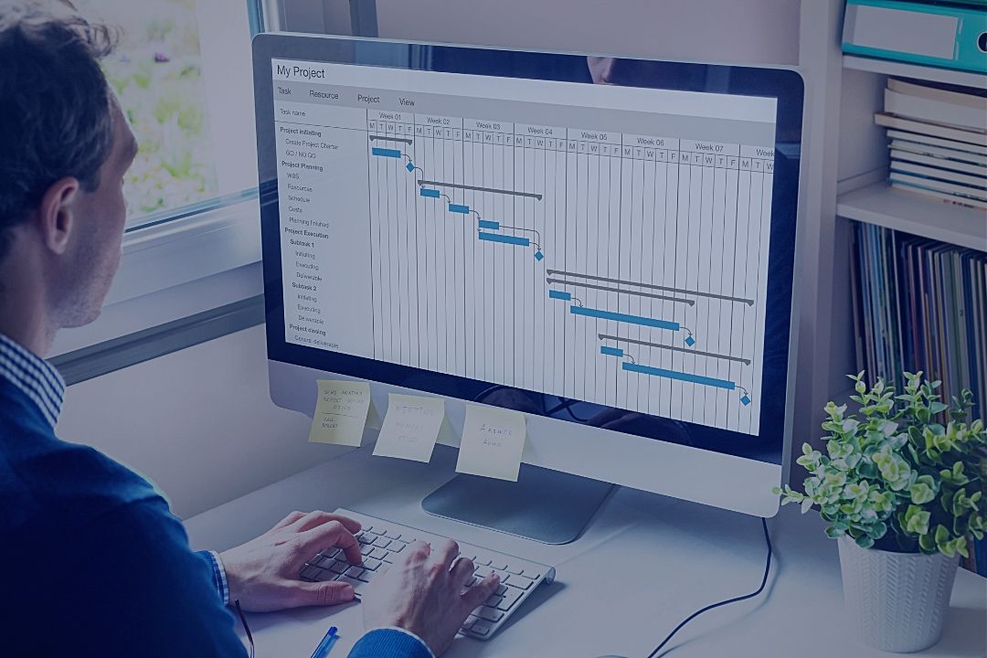 Man working on gantt chart