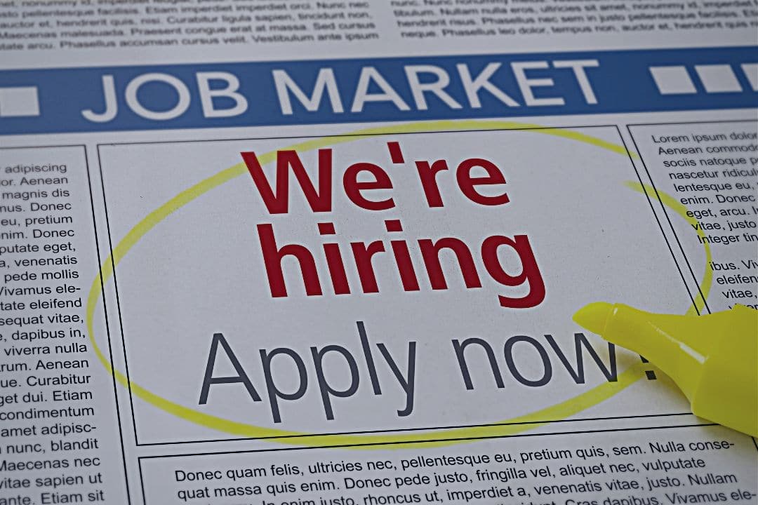 Job ad circled in newspaper