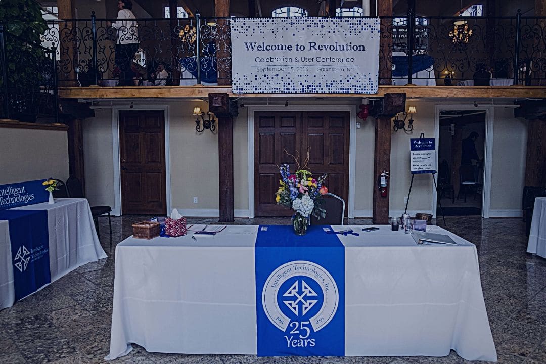 Registration table and decorations from Revolution tradeshow