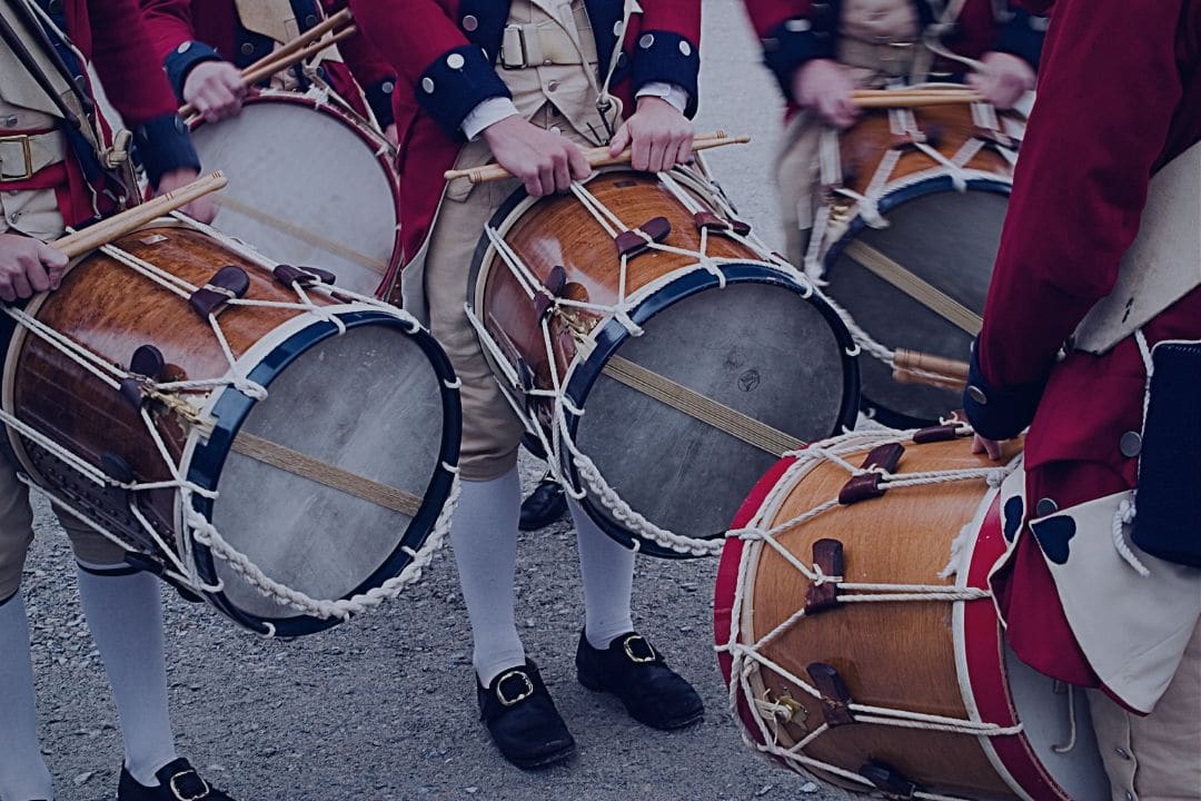 Revolutionary reenactment soldiers playing drums