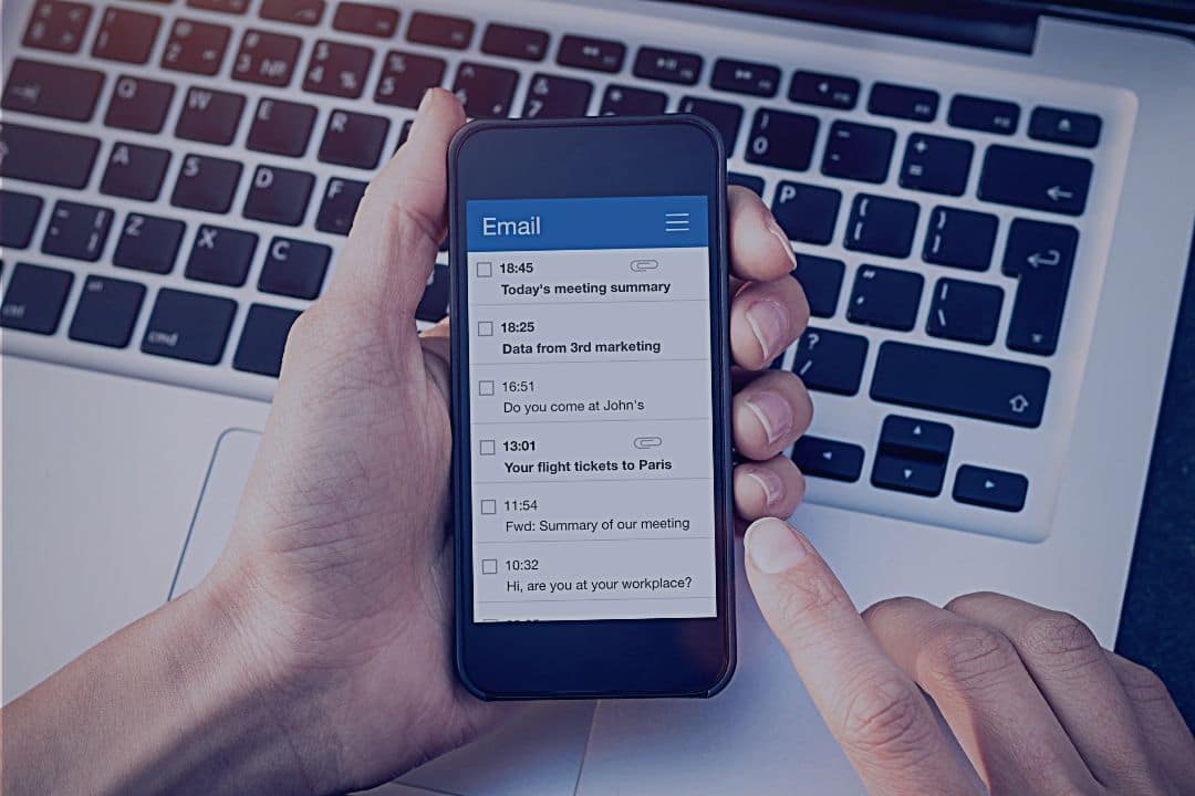 Person reading email on smartphone