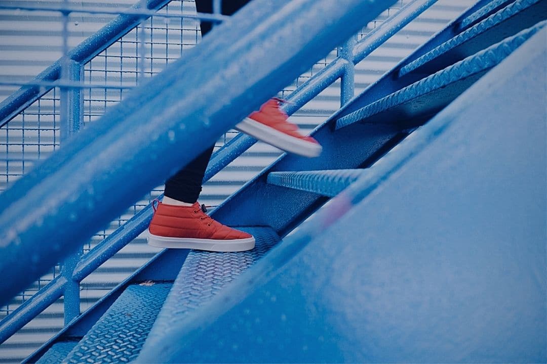 women climbing stairs