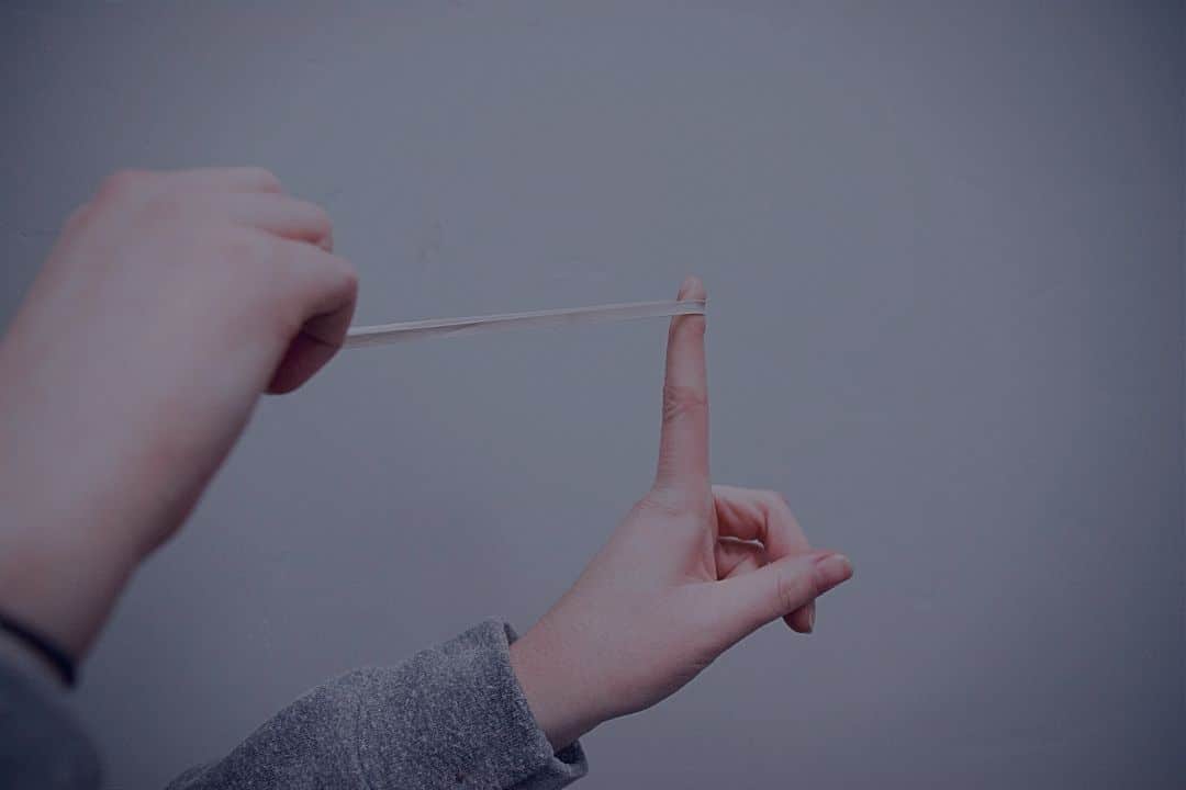 rubber band being pulled